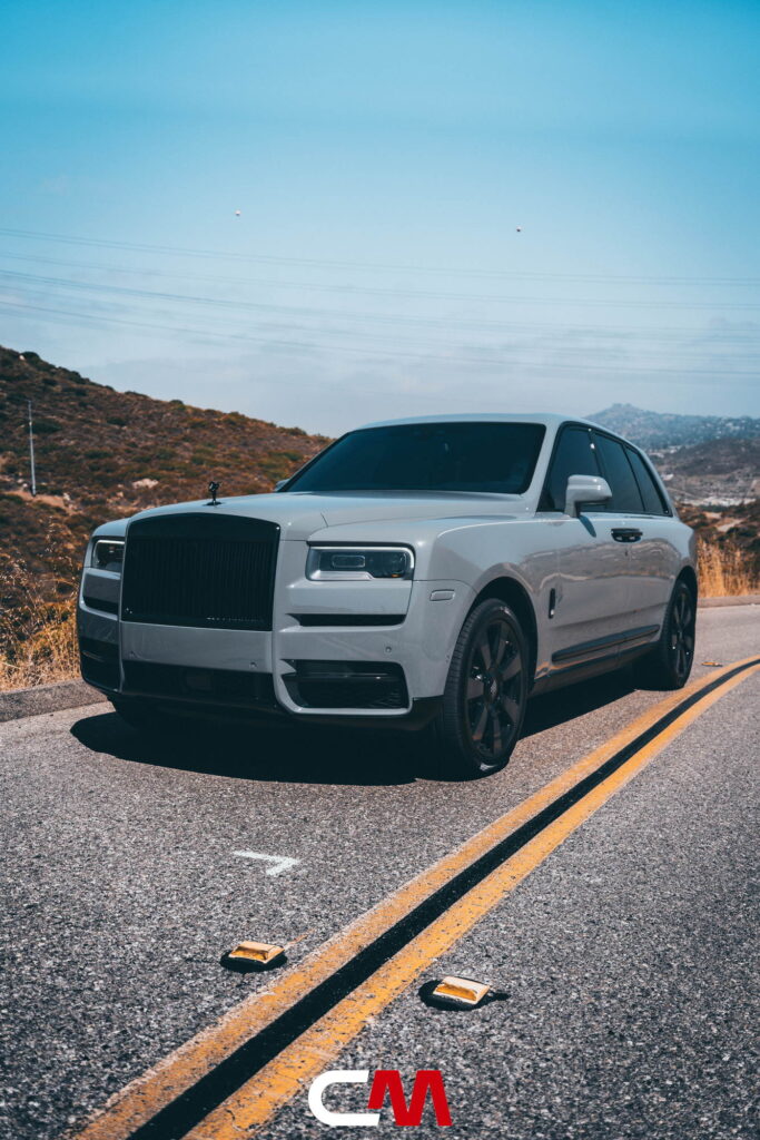 2020 Rolls-Royce Cullinan with a full gloss black chrome delete and black wheels by California Motorsports