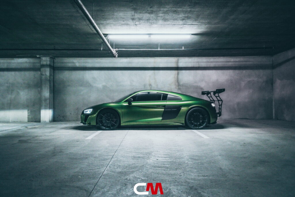 Green Audi R8 V10 with a carbon fiber hood and custom rear wing fitted by California Motorsports
