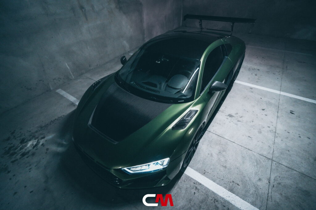 Green Audi R8 V10 with a carbon fiber hood and custom rear wing fitted by California Motorsports