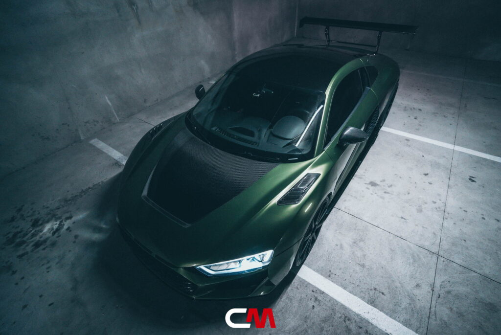 Green Audi R8 V10 with a carbon fiber hood and custom rear wing fitted by California Motorsports