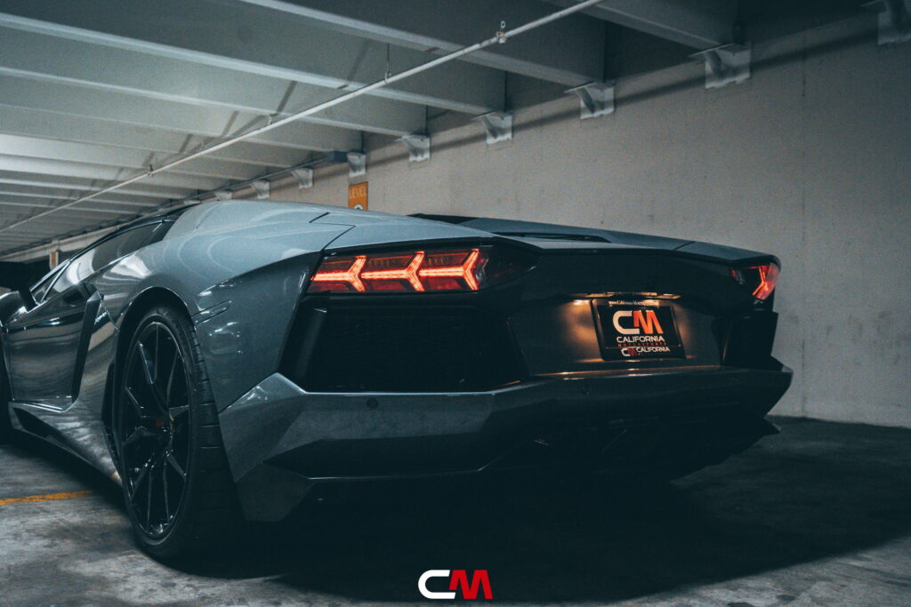 Lamborghini Aventador in a Nardo Gray color-change wrap with black wheels by California Motorsports