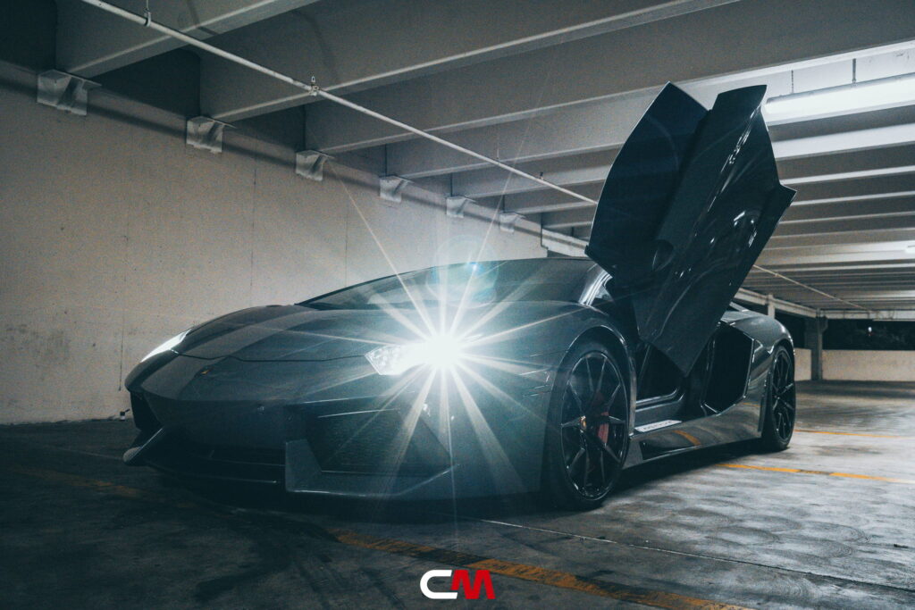 Lamborghini Aventador in a Nardo Gray color-change wrap with black wheels by California Motorsports
