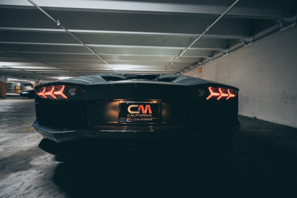 Lamborghini Aventador in a Nardo Gray color-change wrap with black wheels by California Motorsports