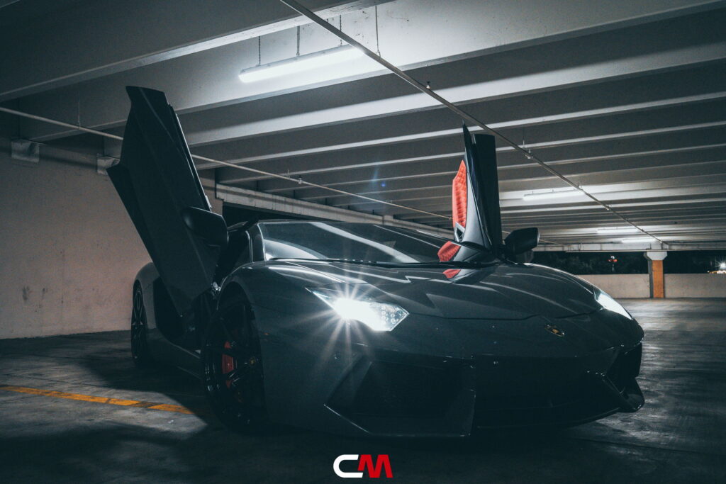 Lamborghini Aventador in a Nardo Gray color-change wrap with black wheels by California Motorsports
