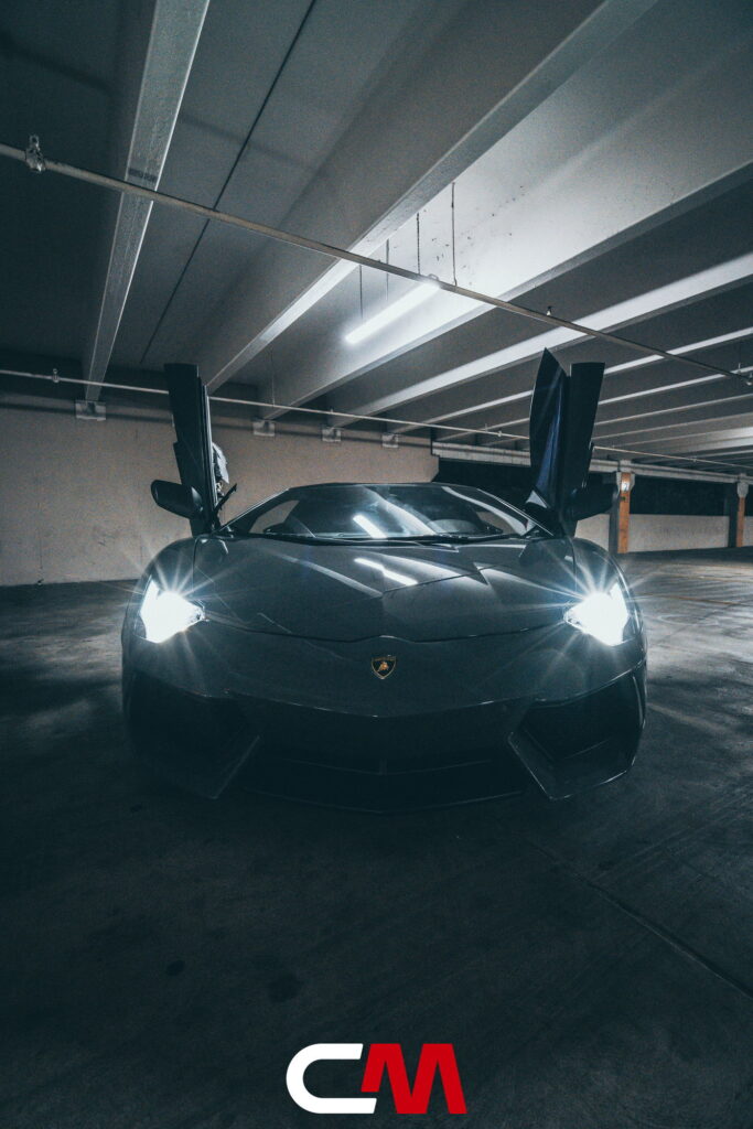 Lamborghini Aventador in a Nardo Gray color-change wrap with black wheels by California Motorsports