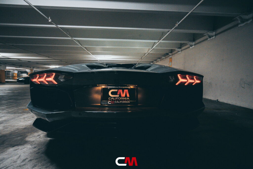 Lamborghini Aventador in a Nardo Gray color-change wrap with black wheels by California Motorsports