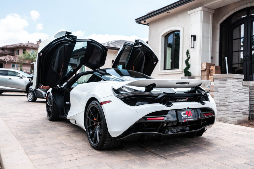 White McLaren 720S with carbon fiber mirror caps and side intake blades fitted by California Motorsports