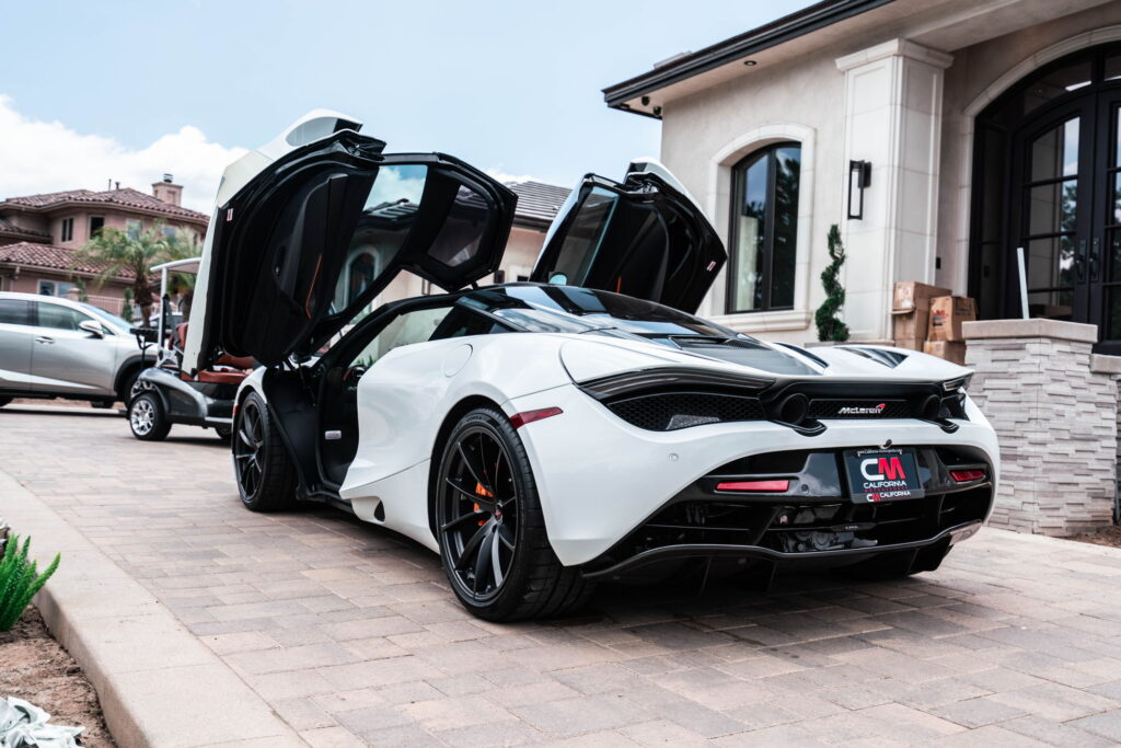 White McLaren 720S with carbon fiber mirror caps and side intake blades fitted by California Motorsports