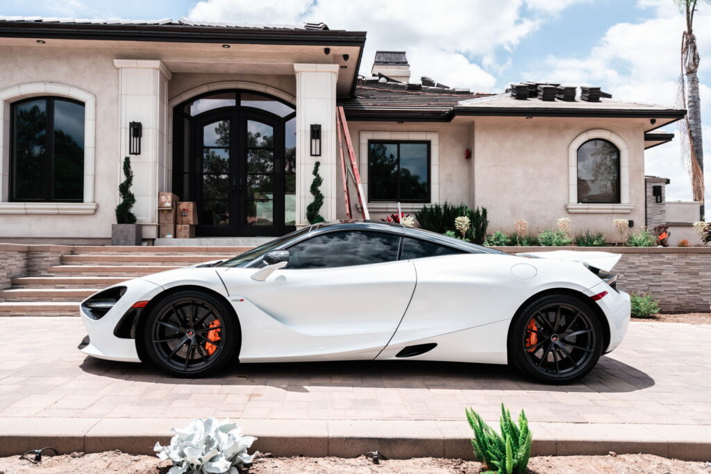 White McLaren 720S with carbon fiber mirror caps and side intake blades fitted by California Motorsports