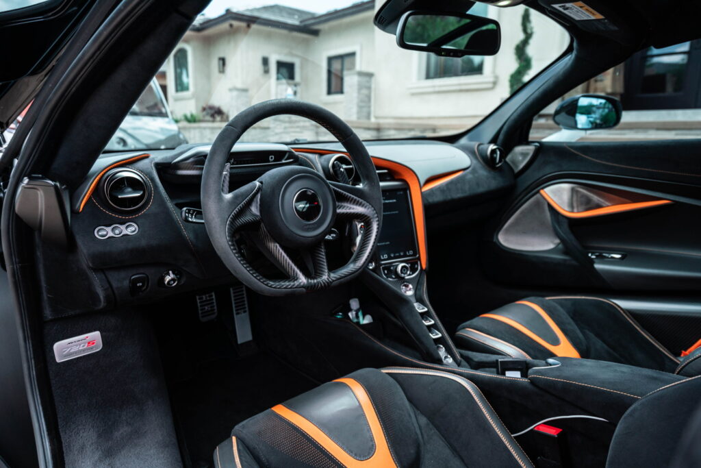 White McLaren 720S with carbon fiber mirror caps and side intake blades fitted by California Motorsports